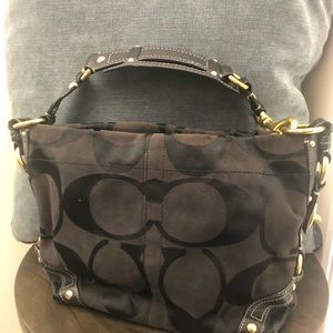 Coach Carly Black canvas signature hobo purse bag.